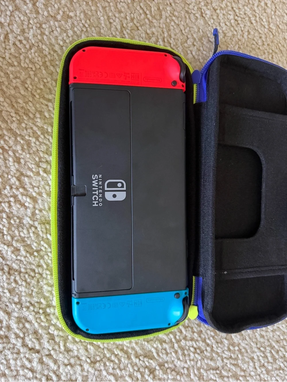 Red & Blue Handheld Nintendo Switch with Travel Case
